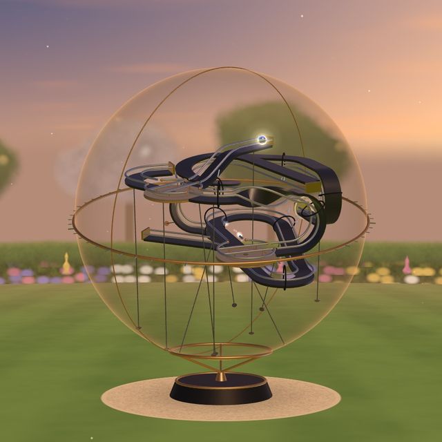 The sphere on a garden lawn at golden hour